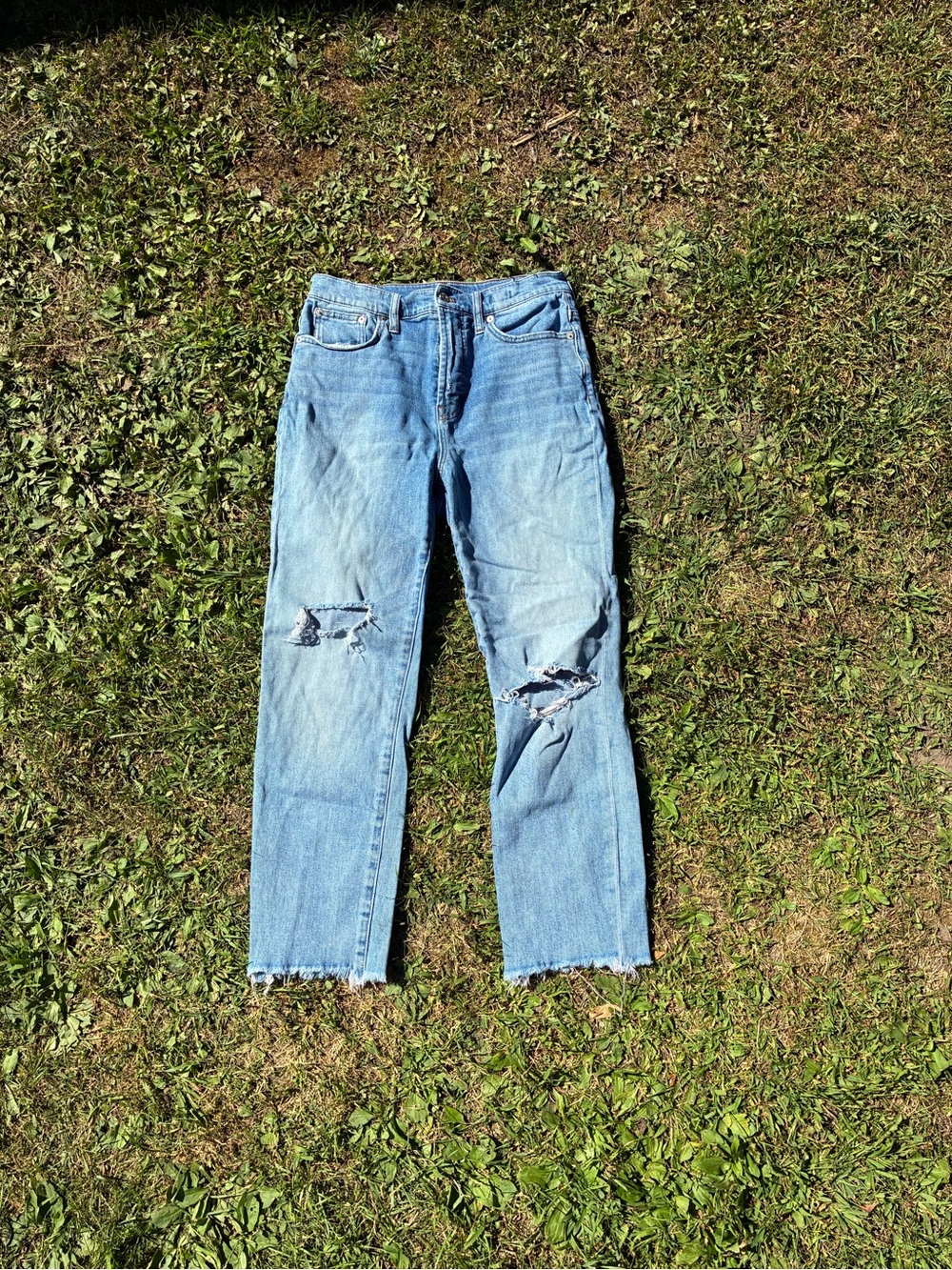 Woman’s Madewell distressed denim jeans
